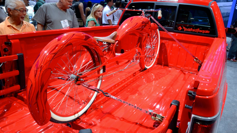 Illustration for article titled This Awesome F-150 With Flames On It Comes With A Matching Chopper Bicycle